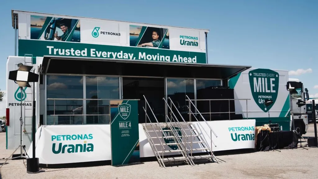 PETRONAS Urania Trusted Every Mile promotional truck showcasing brand experience and driver support at highway activation event.
