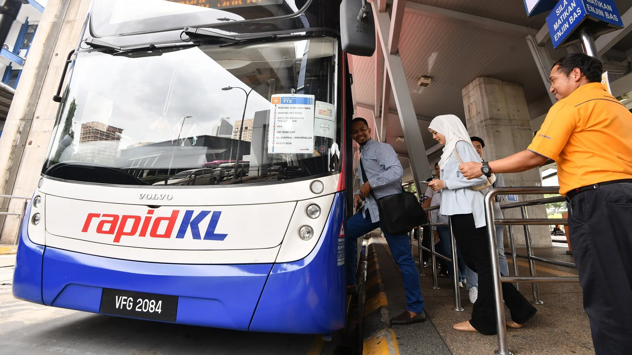 Commuters boarding a Rapid Bus in the Klang Valley transport network