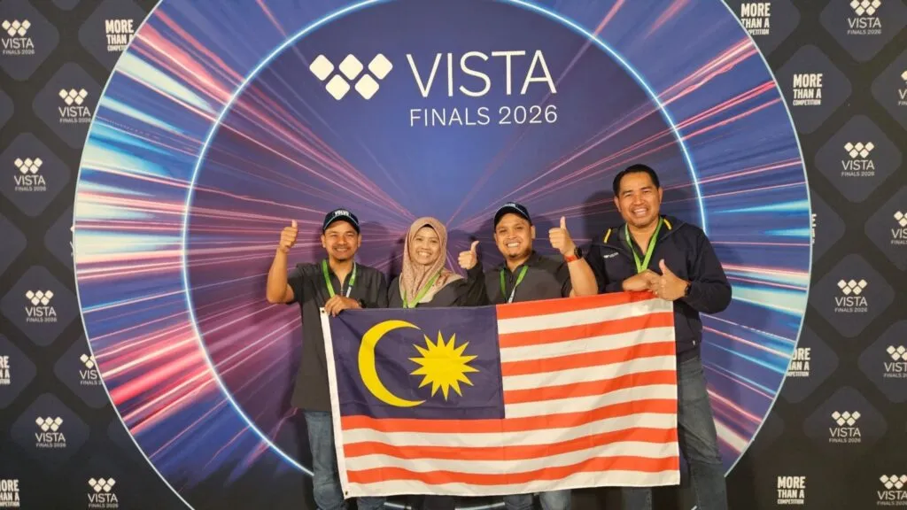 Four members of Team SPICA proudly holding the national flag of Malaysia. (Photo: Volvo Trucks Malaysia/LinkedIn)