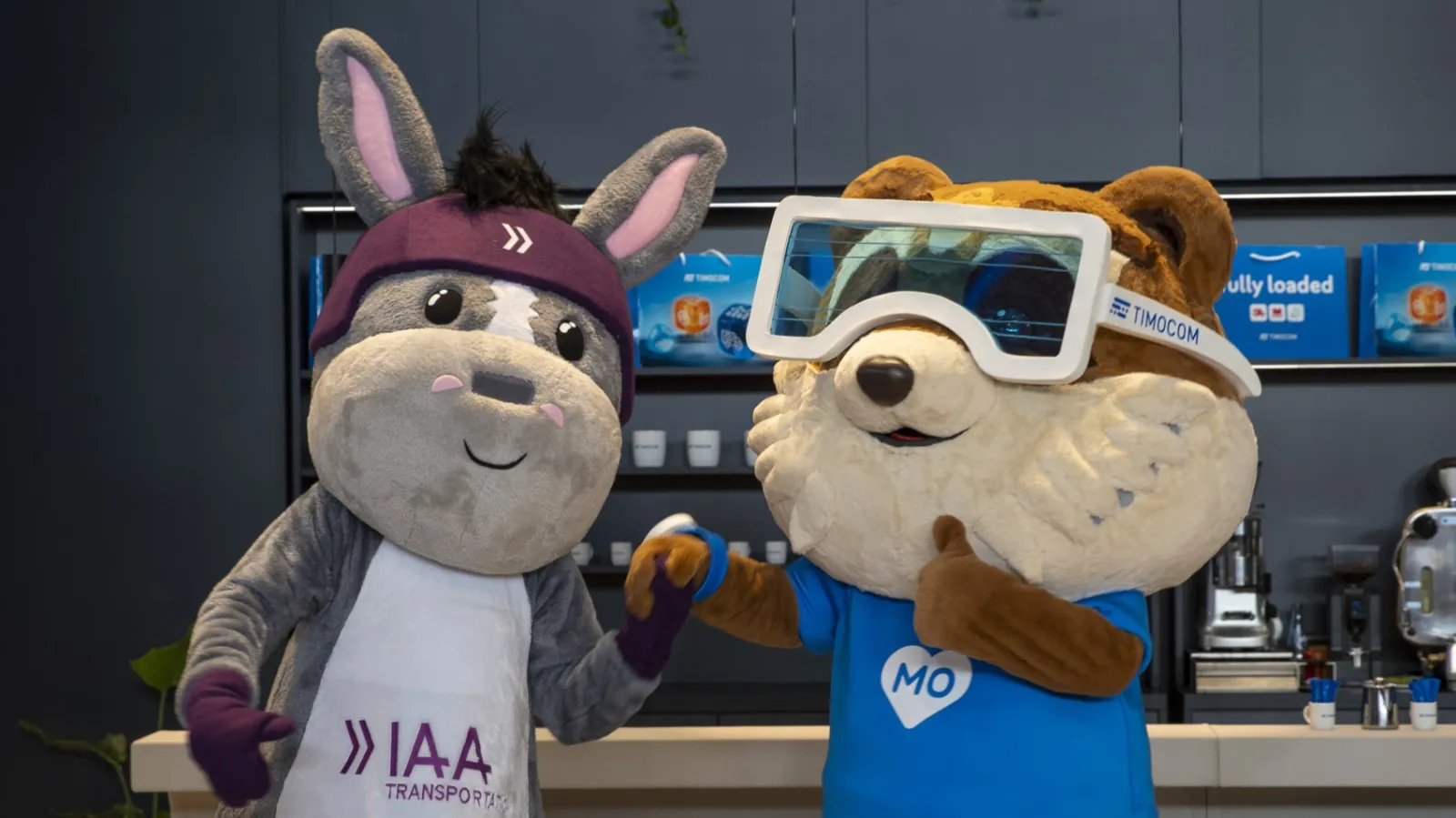 Mascots posing together at an exhibition booth during the IAA Transportation trade fair. (Photo: IAA Transportation)